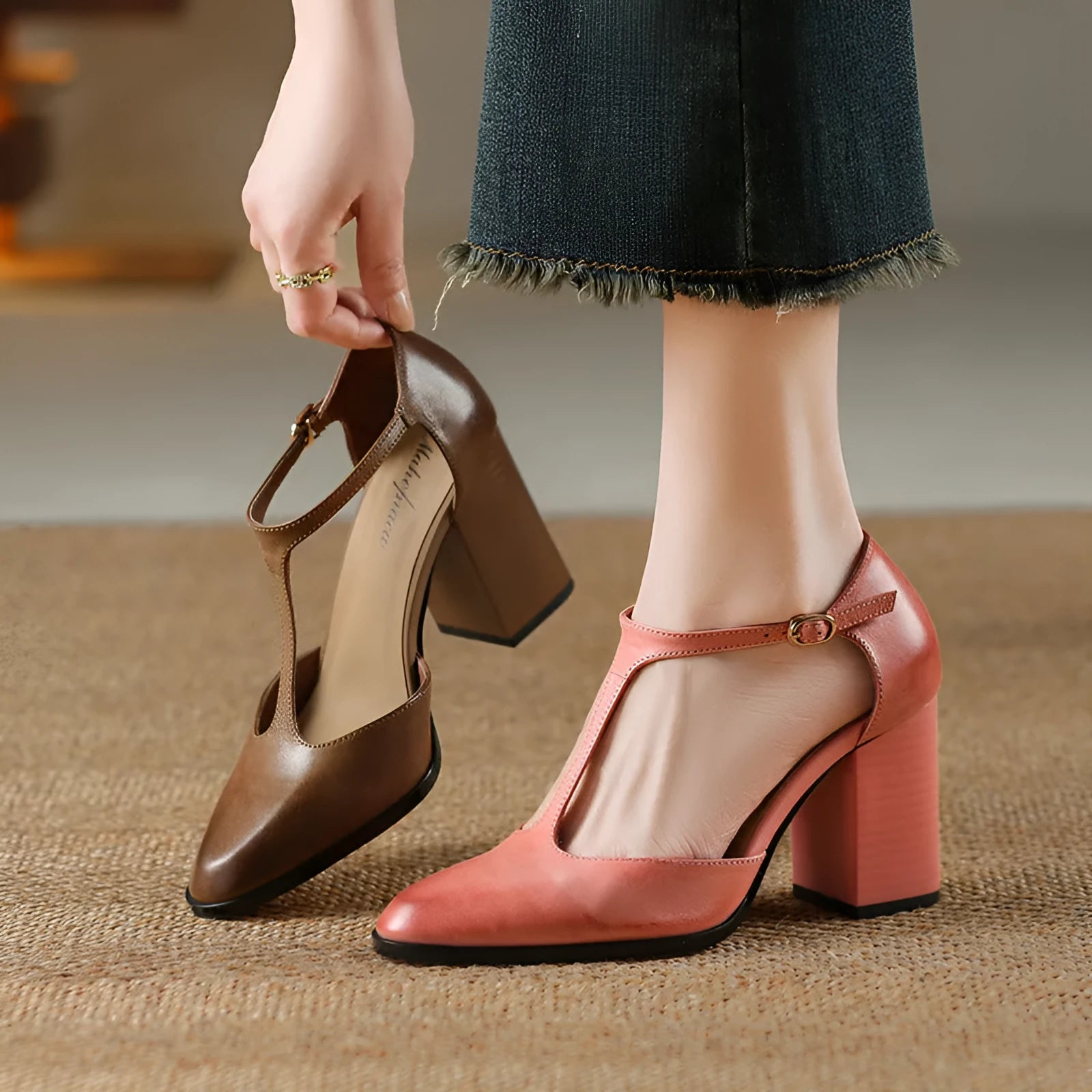 Women's dark brown retro pointed toe Mary Jane shoes with Baotou hollow design and a buckle strap.