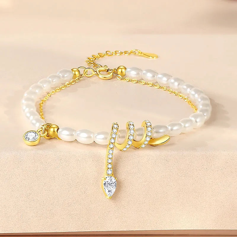 Women's 925 silver pearl snake bracelet in gold tone and white gold colour options