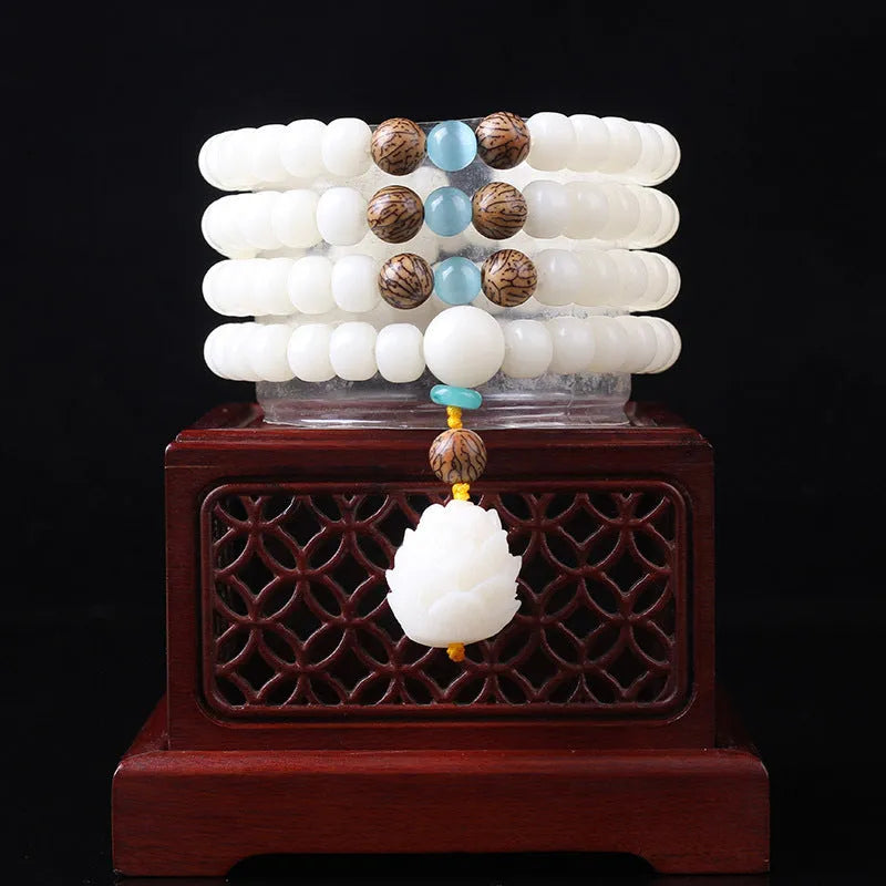 White Jade Bodhi Beads Long Bracelet with 6x8mm beads in multiple style options.