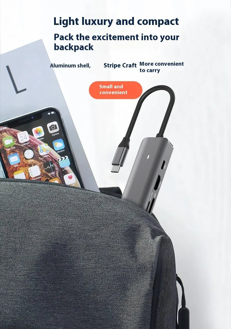 7-in-1 card reader and USB hub for laptops with multiple interface ports