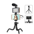 Black Octopus Yripod live broadcast kit with flexible legs, ballhead, and fill light microphone for iPhone.