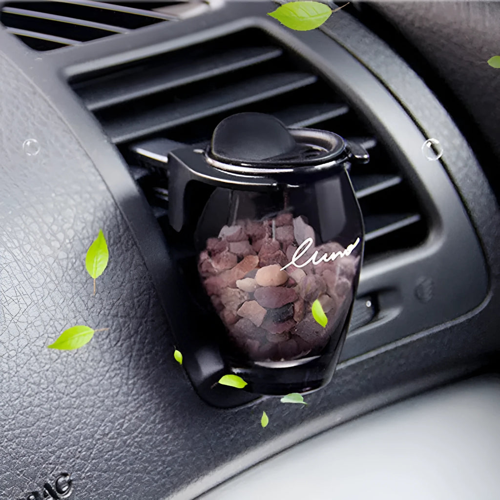 Car air outlet aromatherapy with glass perfume seat and zeolite fragrance block for long-lasting scent