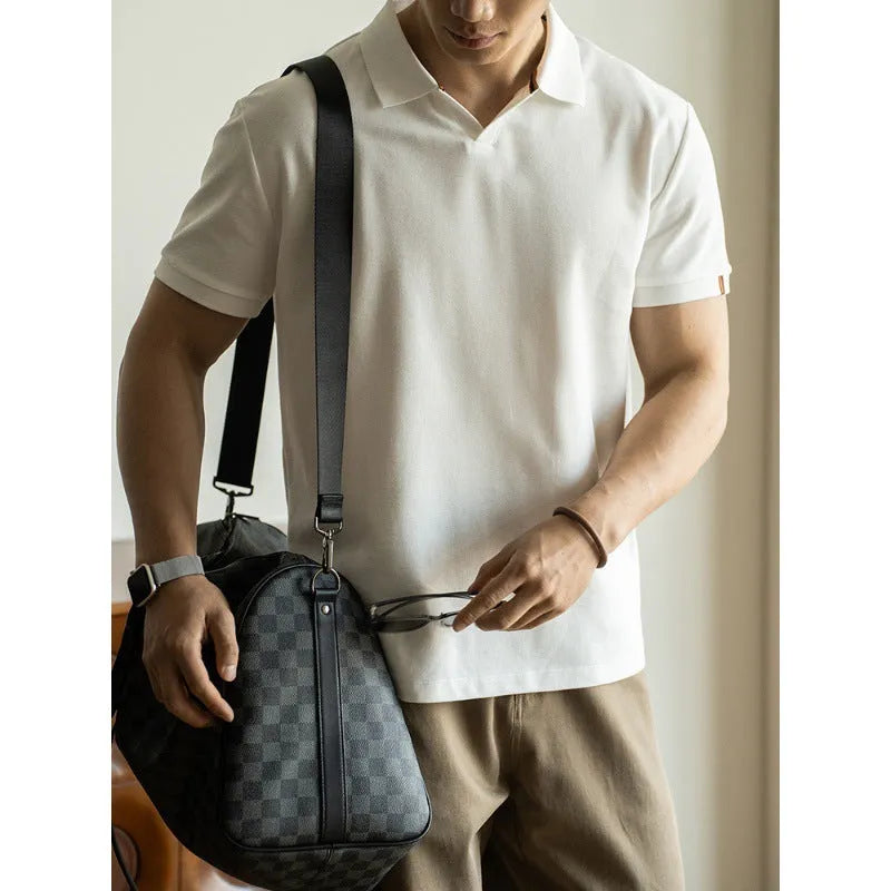 American-style short-sleeve polo shirt in blue, shown on a model.