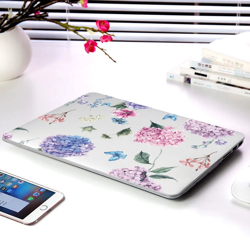 Plastic protective shell for Apple MacBook with partial flower series floral design showing five pattern options