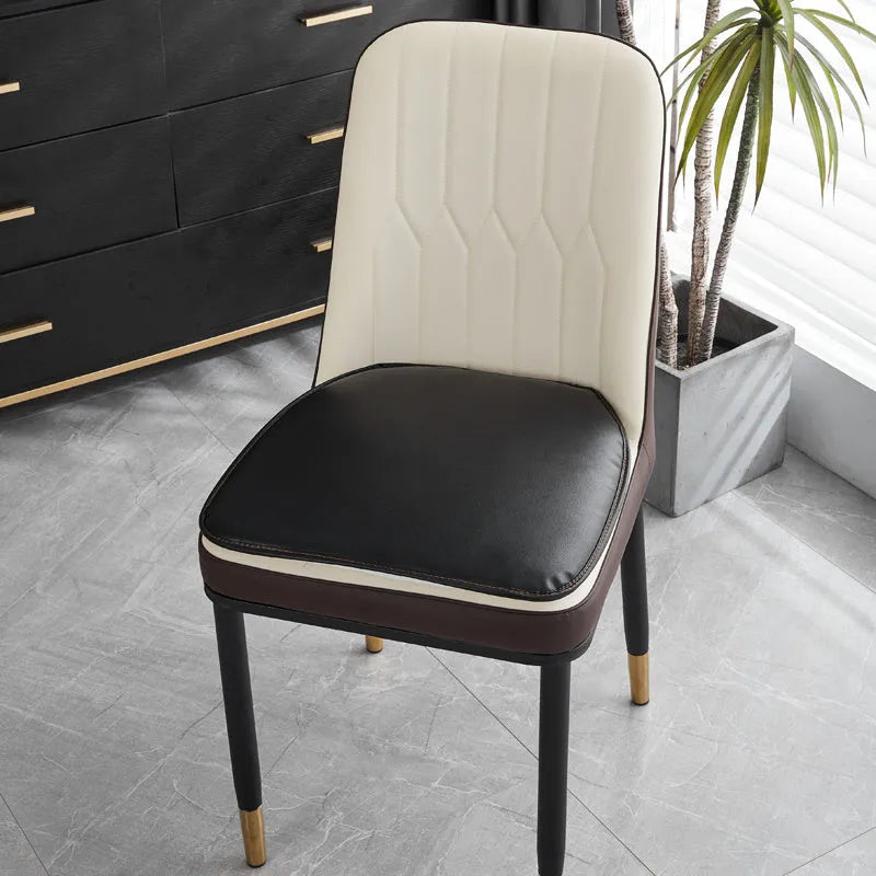 Leather horseshoe-shaped seat cushion in beige colour showing thickness and non-slip design