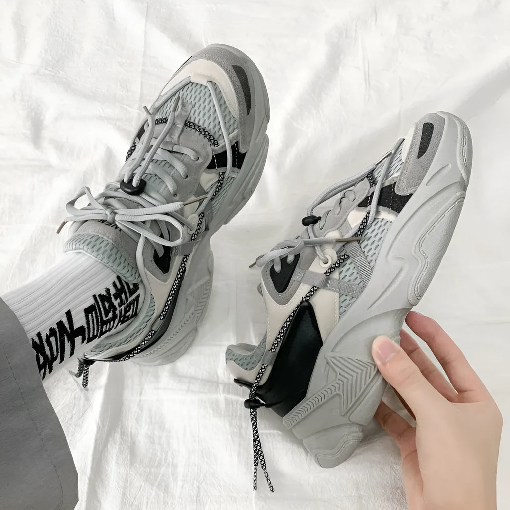Men's white platform dad sneakers with lace-up front and chunky sole for height increase.