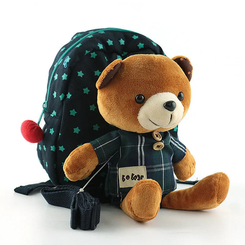 Children's anti-lost cartoon schoolbag in canvas, blue colour, with zipper closure.