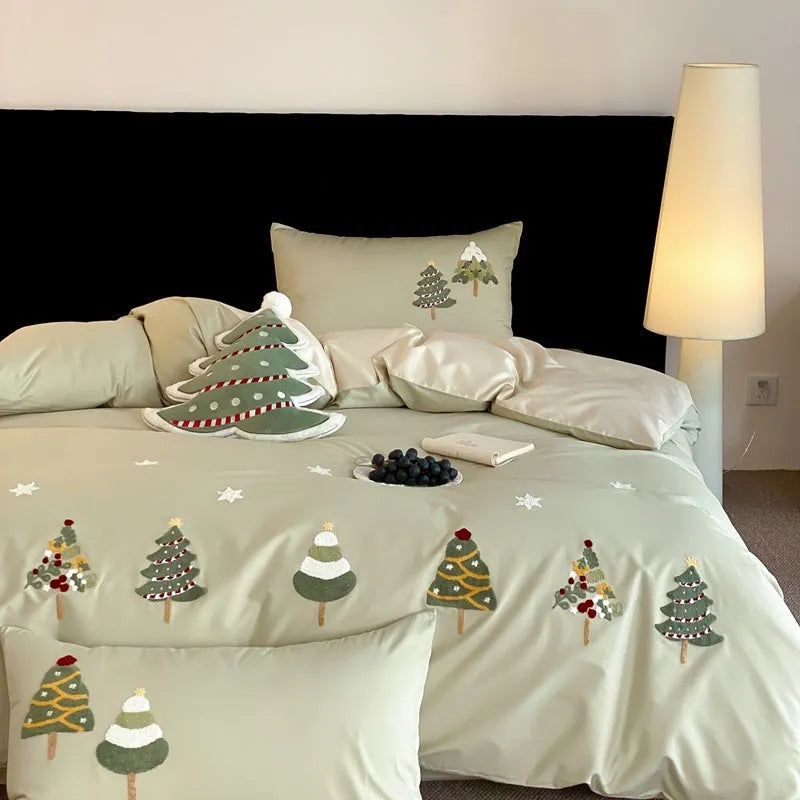 Pure cotton four-piece bedding set with embroidered Christmas tree pattern showing duvet cover, bed sheet and pillowcases