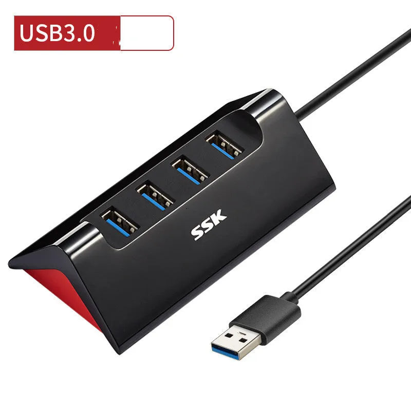 Black USB expansion dock with four ports and micro USB power connector
