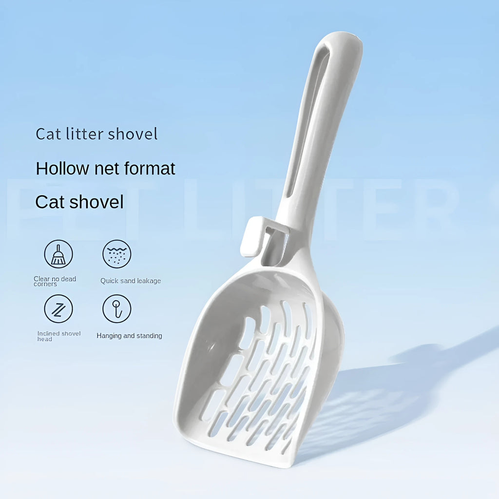 Grey plastic cat litter scoop resting on its matching plastic base stand.