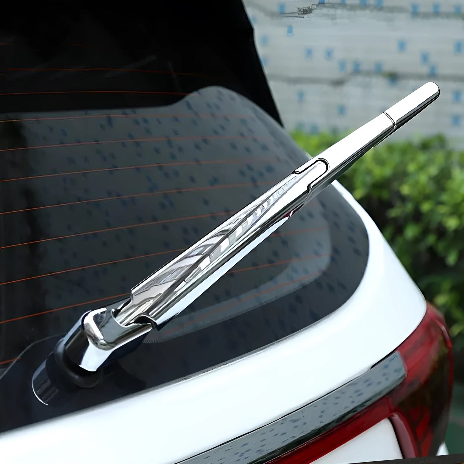 Four silvery ABS plastic rear window wiper cover trims for 2010 Hyundai models.