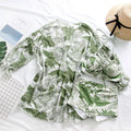 Green flower pattern matching bikini for women and beach pants for men in polyester spandex