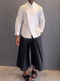 Women's white asymmetric long sleeve shirt and black pleated trousers casual two-piece set