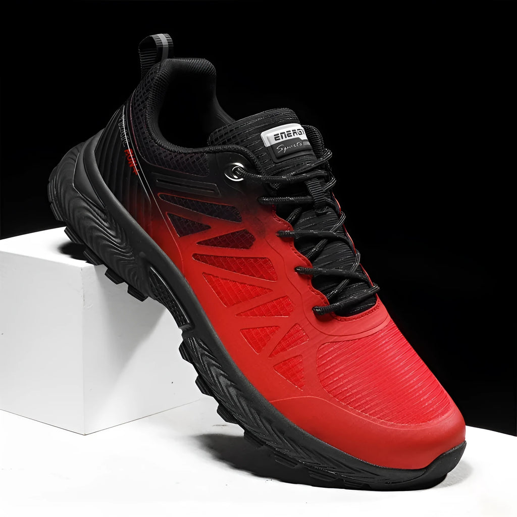 Men's black and orange breathable mesh running shoe with lace-up front and rubber sole
