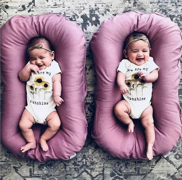 Portable cotton baby nest crib measuring 75x45cm with PP cotton filler in beige colour