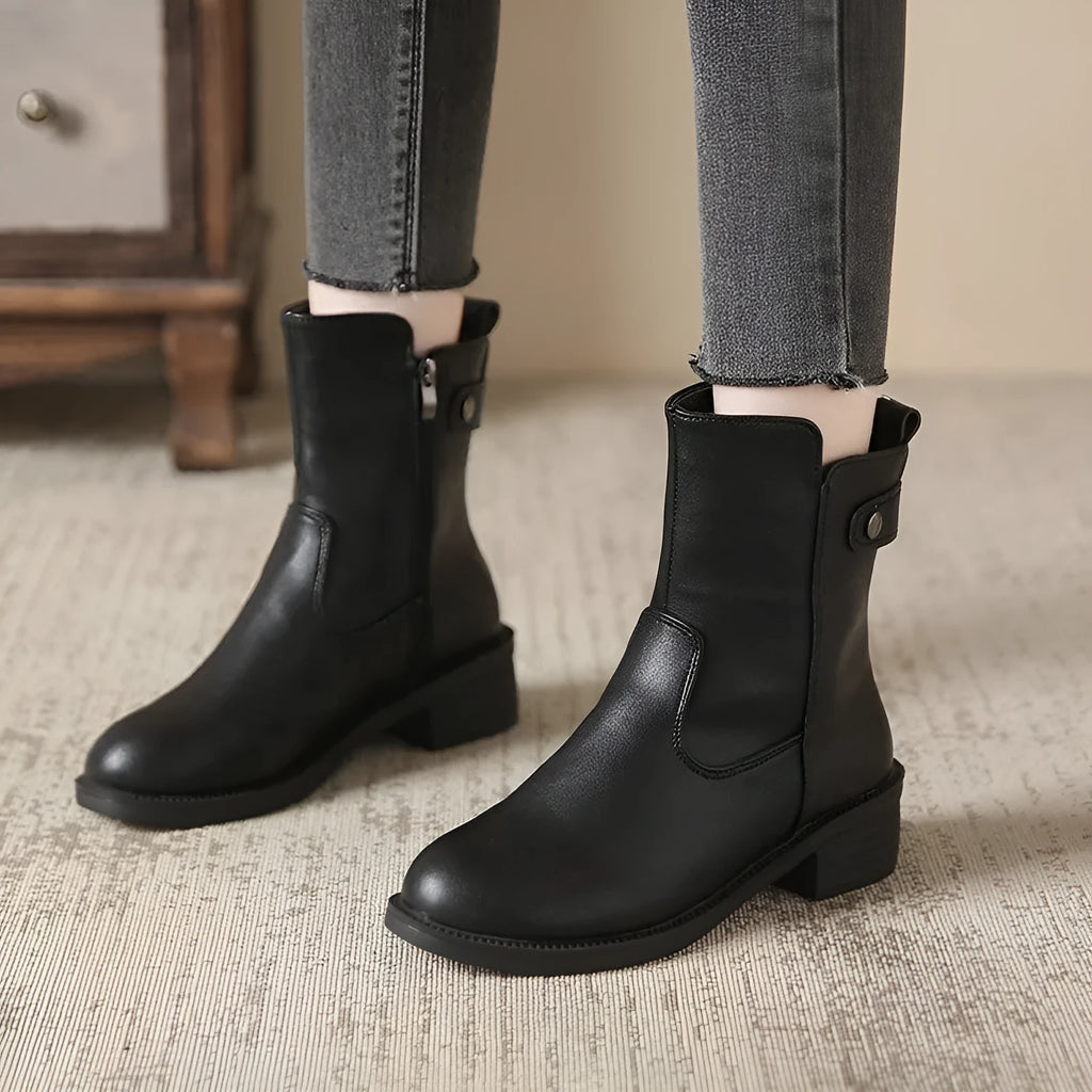 Women's black side zip ankle boots with round toe and low rubber sole