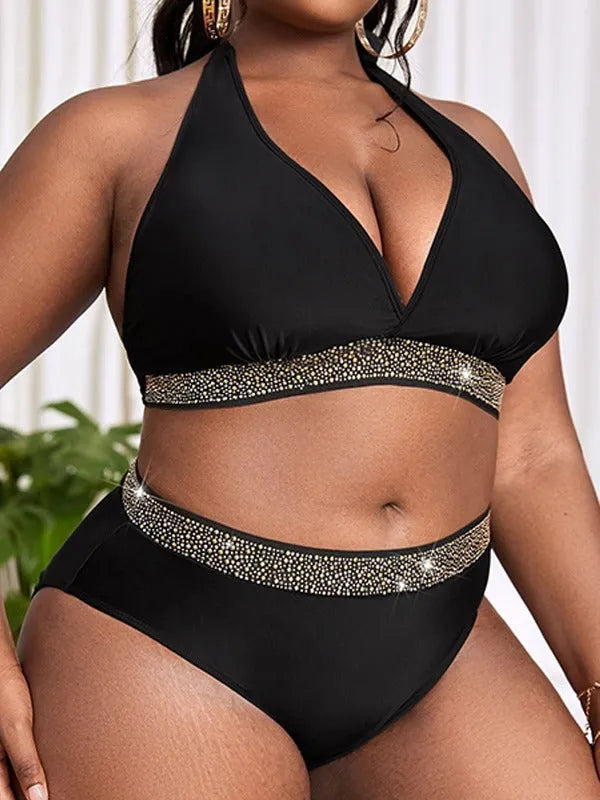 Black plus size women's bikini set with bra top and shorts on a mannequin.