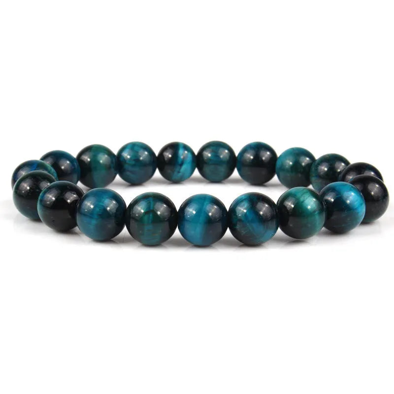 Unisex tigereye crystal bead bracelet with round geometric beads, shown in a dark blue variant.