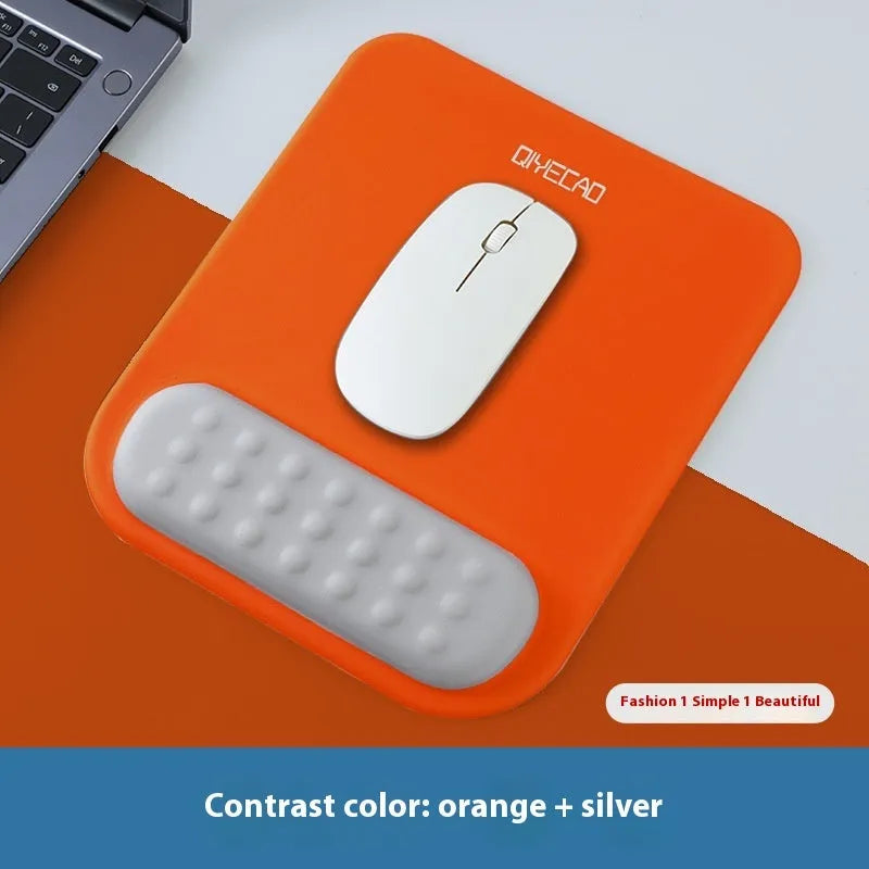 Ergonomic cloth silicone mouse pad with raised wrist support in mint green colour.