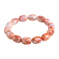 Natural cherry agate bracelet with 10x14mm barrel beads and traditional Ruyi design elements