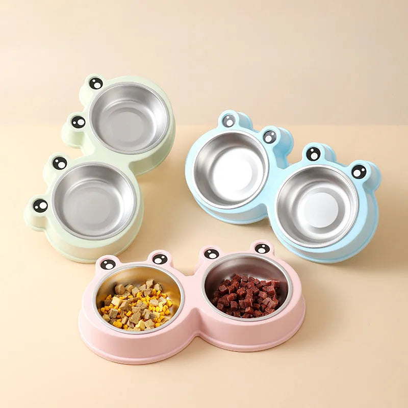 Stainless steel double pet bowl set with anti-slip frog base in blue, for cat or dog food and water.