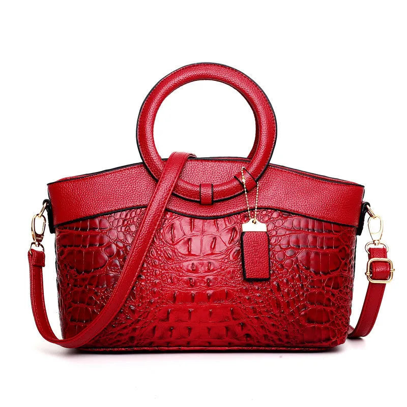 Ladies casual fabric handbag in multiple colours with zipper compartments, shown with shoulder strap.