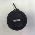 Portable waterproof Bluetooth speaker in multiple colours with a mountaineering buckle for bag attachment.