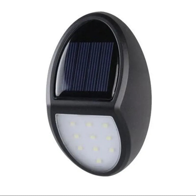 Black LED solar wall light with solar panel and automatic sensor for outdoor use