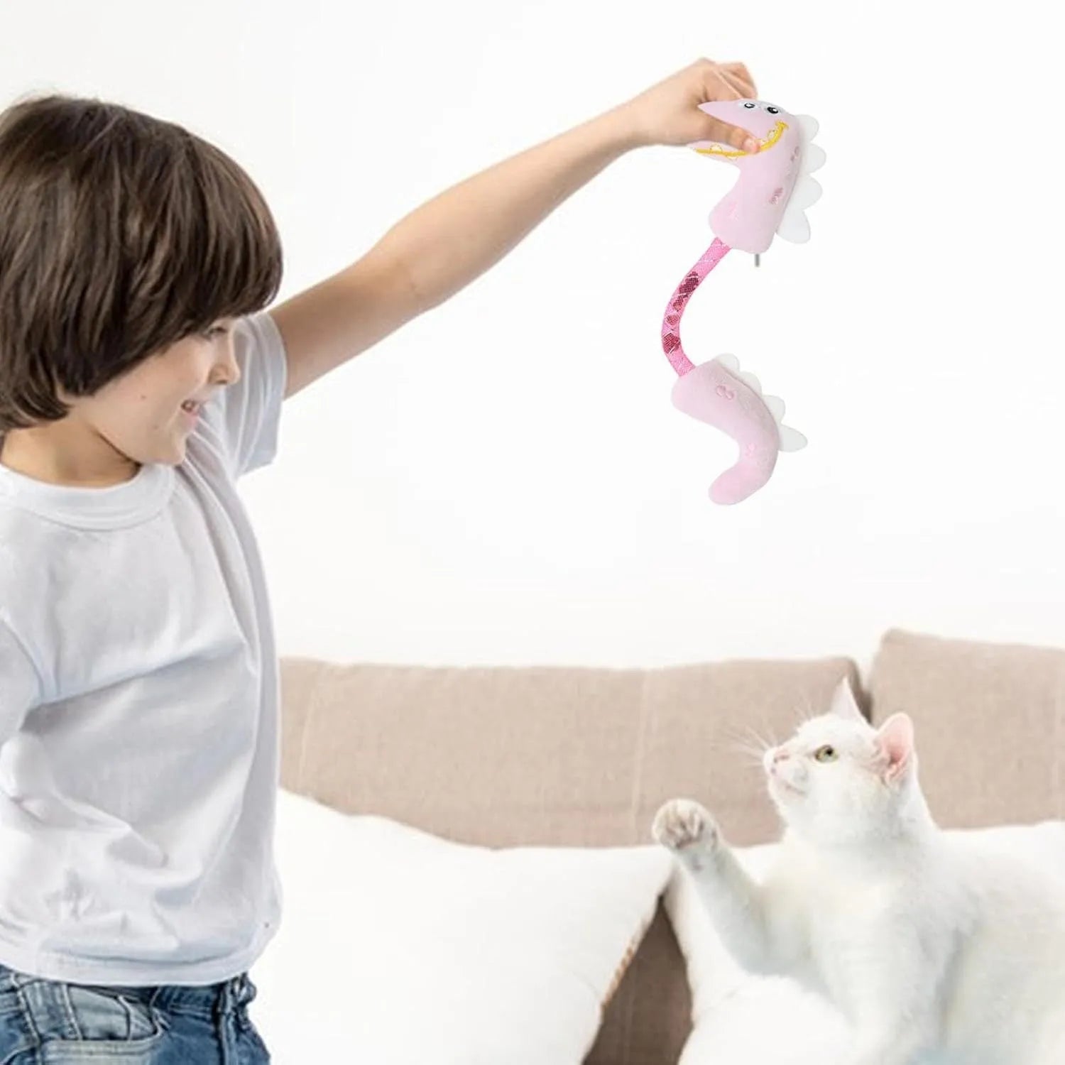 Set of four cat toys: plush fish, mouse, bunny, and a catnip rope on a plain background