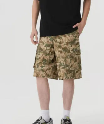 Men's camouflage pattern shorts with retro workwear styling and loose cropped fit