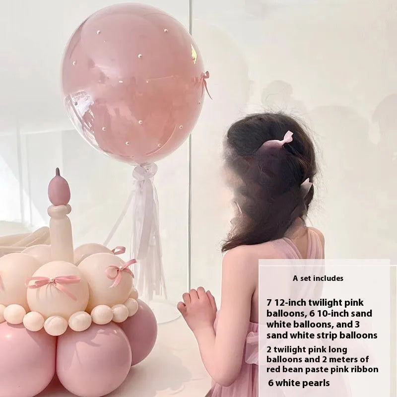 Finished round balloon bouquet decoration for cake table centrepiece.