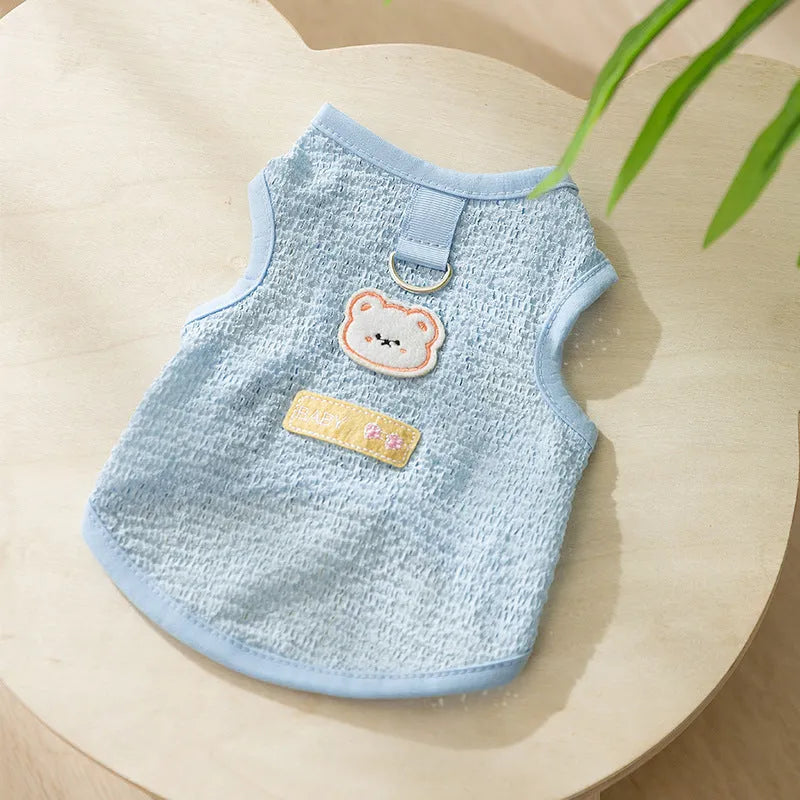 Green bear patch cat clothing with hollowed-out knitted fabric design on a feline