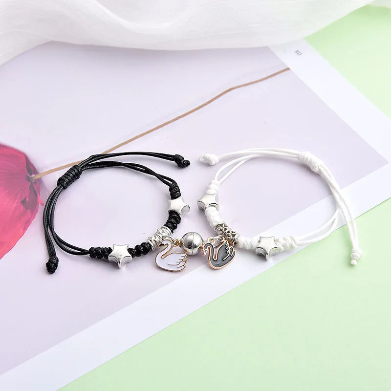 Electroplated alloy suction cup couple bracelets with crown and diamond designs