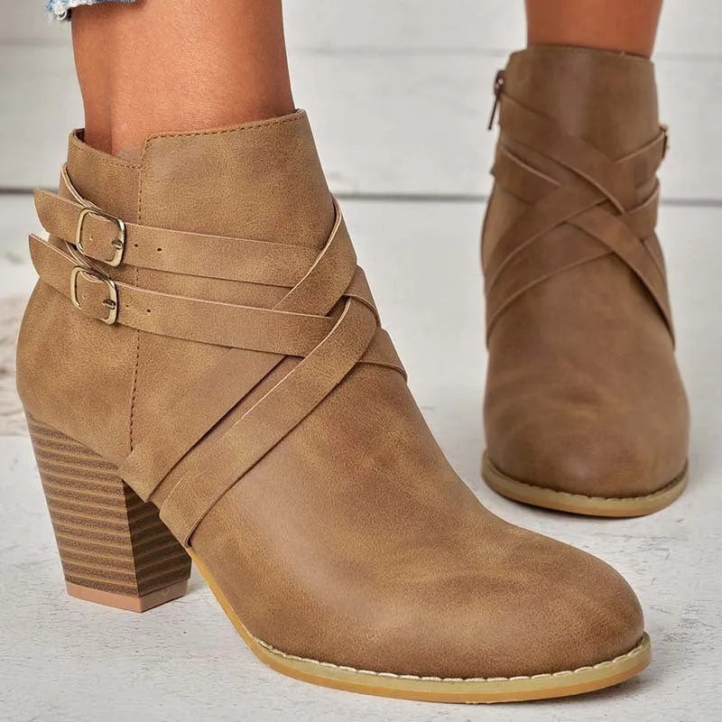 Women's grey PU leather ankle boot with a 7cm heel, side zipper, and belt buckle.
