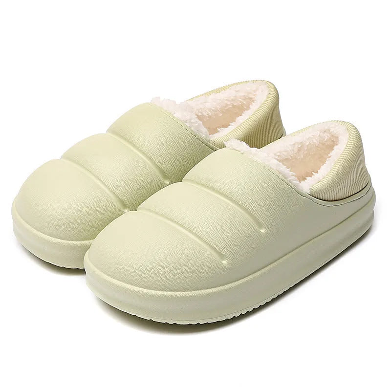 Yellow and green waterproof EVA winter house slippers with plush lining and non-slip sole.