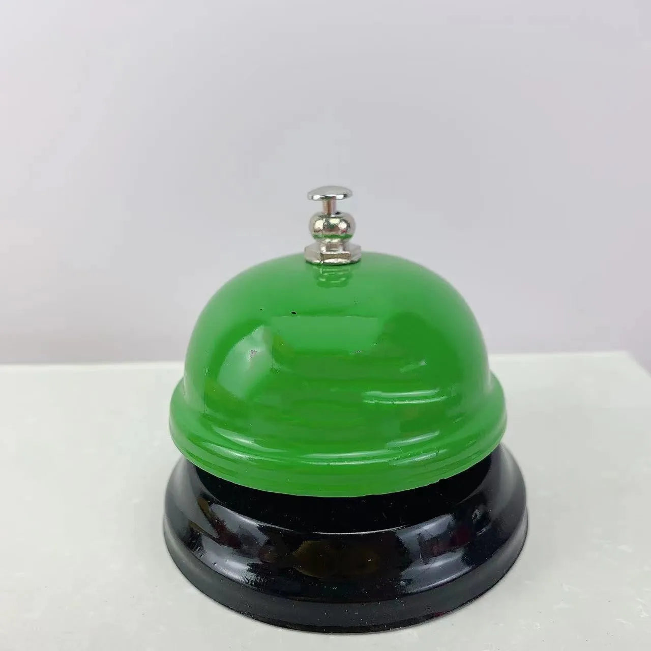 Iron class game bell in one of eleven colour options including red, green, blue, pink and yellow.