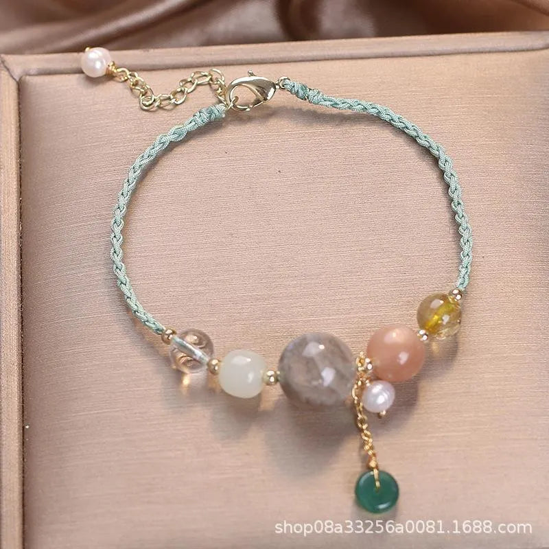 Hand-woven crystal bracelet with sequin details and adjustable buckle in three colour options