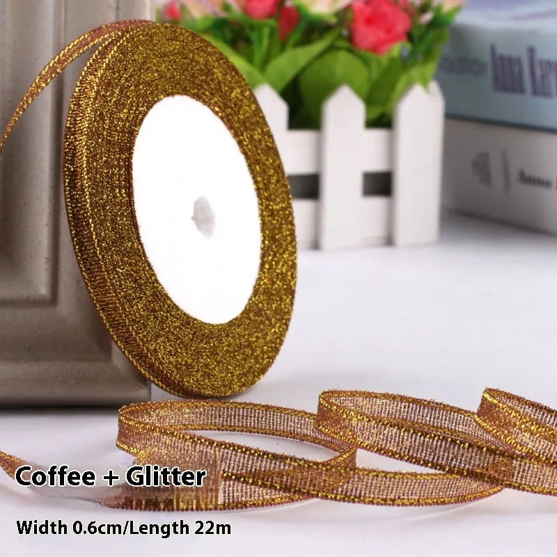 Roll of 0.6cm wide coloured polyester gift ribbon with 22 metre length.