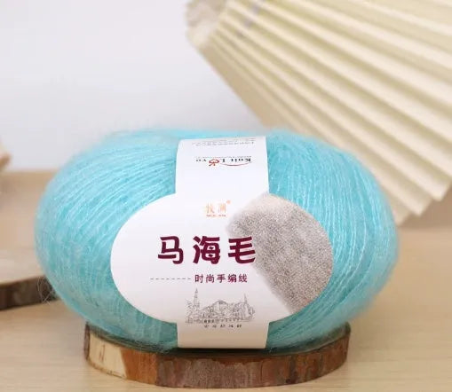Mohair wool ball for DIY scarf knitting in assorted colours on white background