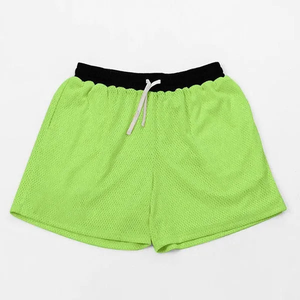 Men's mesh quick-drying shorts in solid colours for running and fitness.