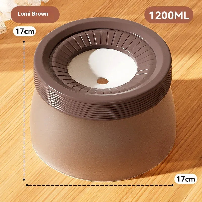 Green suspended non-spill water bowl for dogs and cats, showing the elevated bowl above the base plate