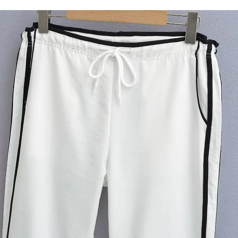 Women's slim straight trousers with parallel bar pattern in thin ribbed fabric, low waist design
