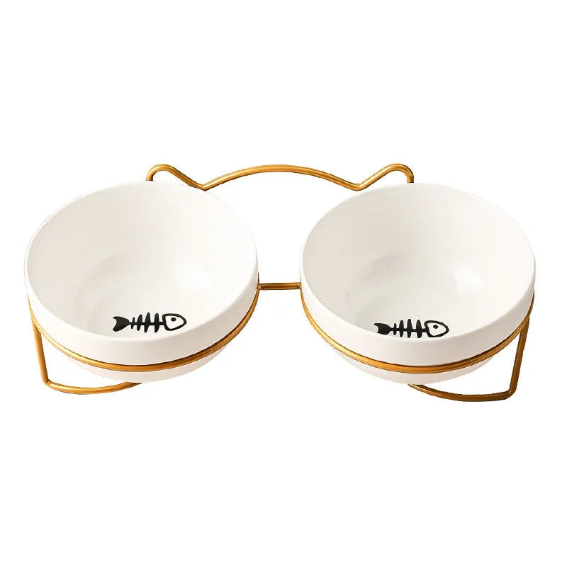 White ceramic pet bowl with decorative pattern in iron frame with cat ear accents