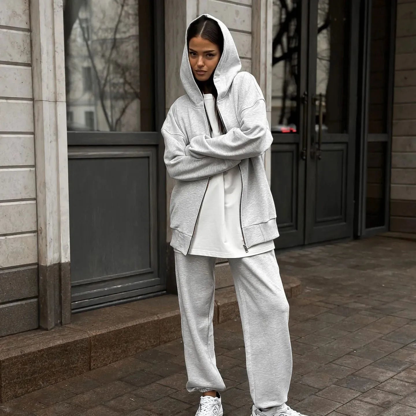 Red loose street style long-sleeved coat and trousers two-piece set on a model