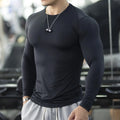 Men's black long-sleeved slim fit fitness tights for running and gym workouts