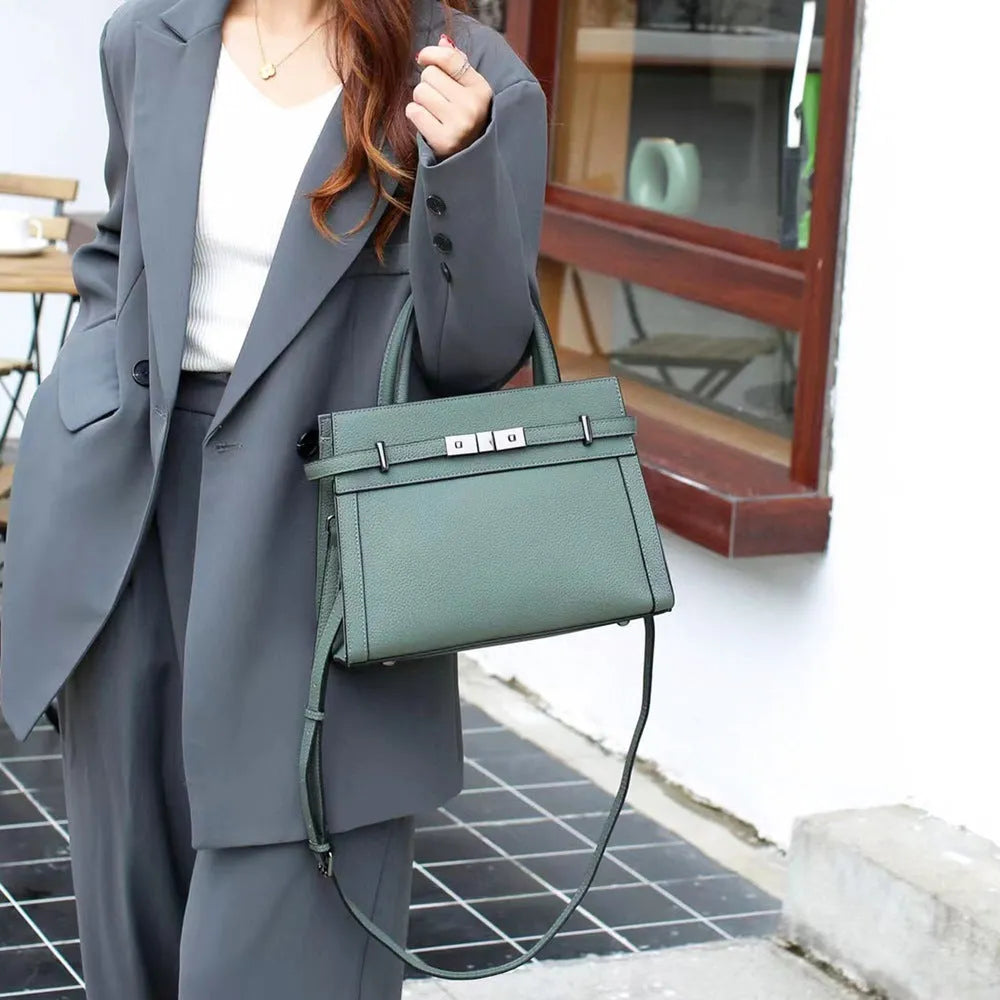 Small square genuine leather shoulder bag in neutral colour with internal organisation compartments