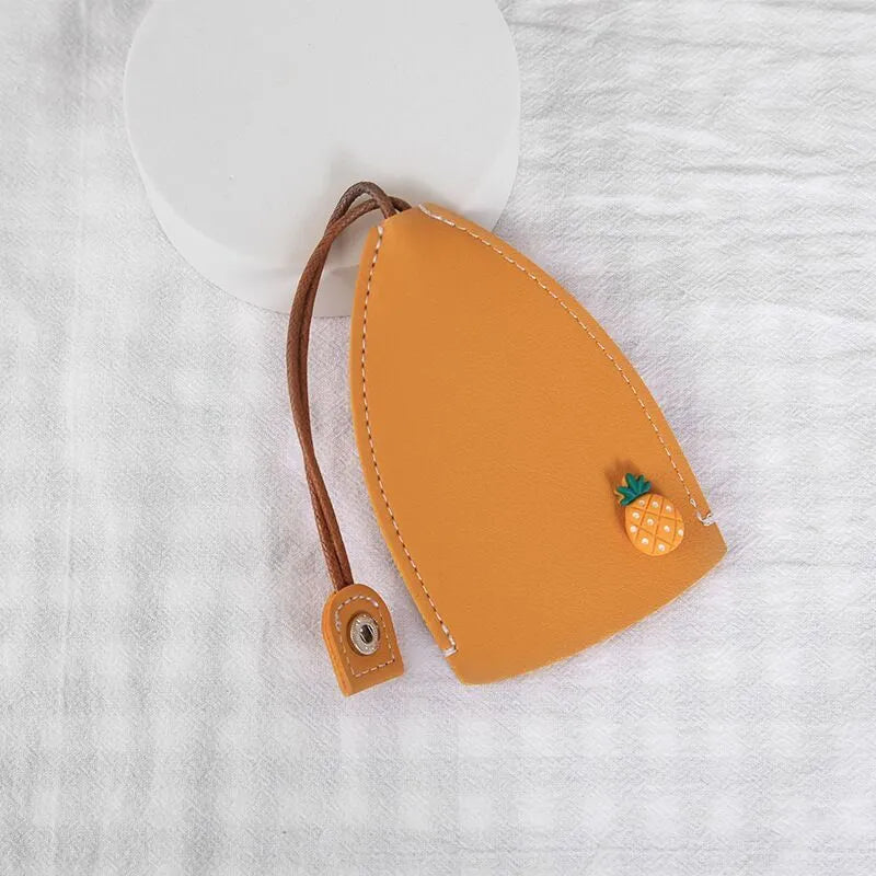 Colourful cartoon pull-out key case for car keys with PU leather construction