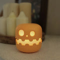 Pumpkin-shaped silicone night light with soft glow, 102mm x 94mm, cordless Halloween decoration