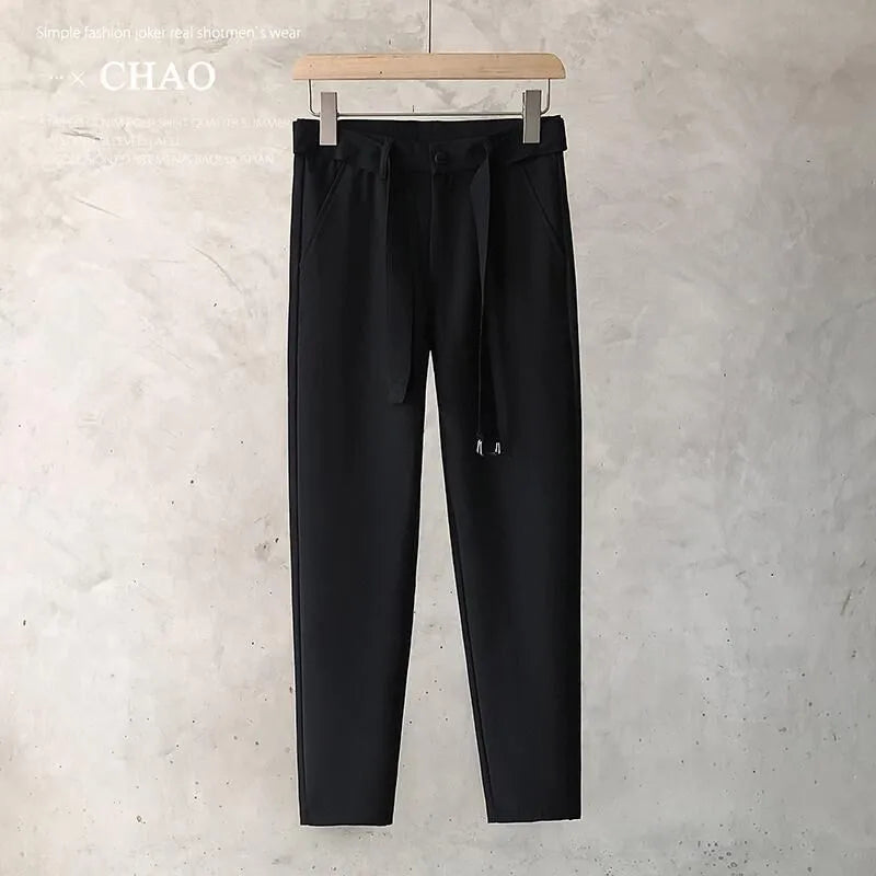 Boys slim straight wool trousers with tapered fit and straight leg opening in black colour