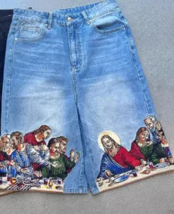 Men's blue cotton shorts with Jesus print on back pocket showing tapered leg fit
